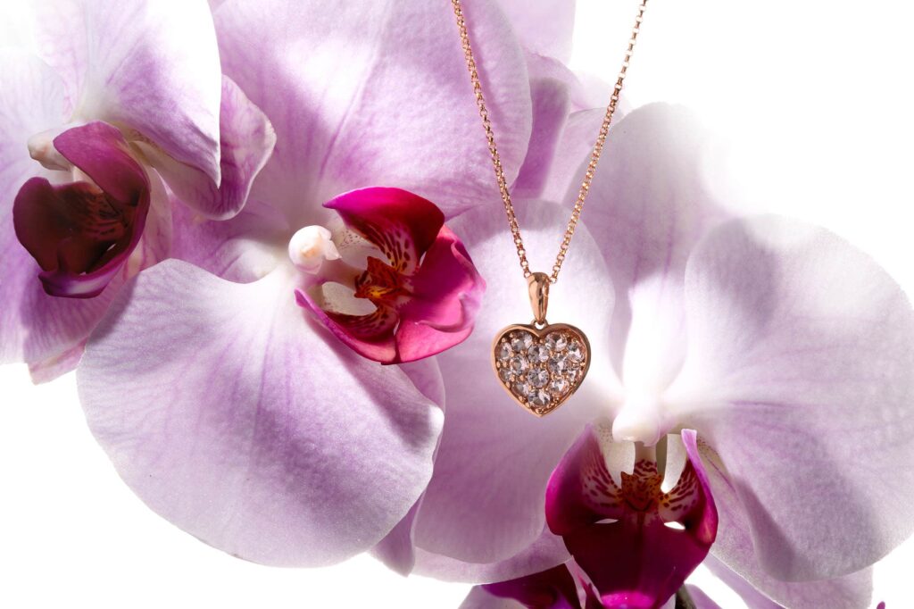 Gold Pendant and The Orchid